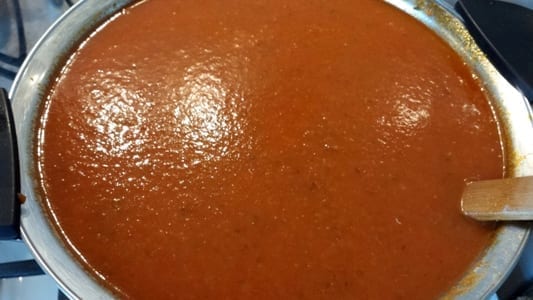 Tomatensaus opkoken